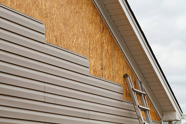 Professional Siding Repair technician working in Gratz, PA